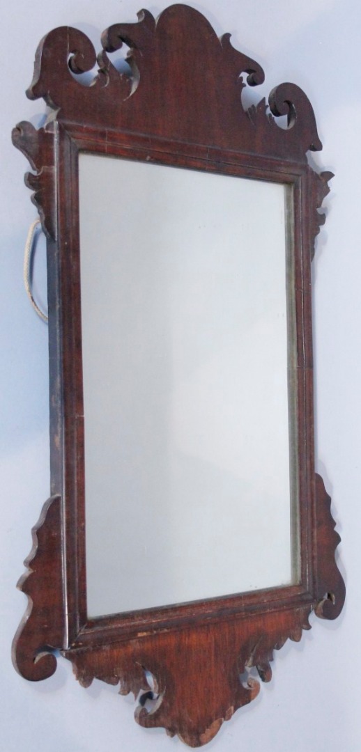 Appraisal: A late thC mahogany framed fret mirror of small proportion