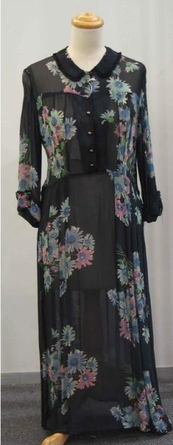 Appraisal: Afternoon dress in navy floral printed georgette with buttoned bodice