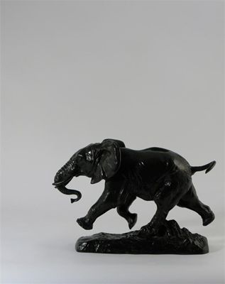 Appraisal: Elephant du Senegal' a patinated bronze model of a stampeding