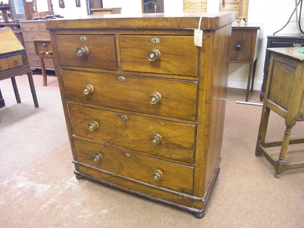 Appraisal: A Victorian walnut bedroom chest two short and three long