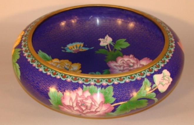 Appraisal: Blue ground with flowers and butterfly decoration H inches Diam