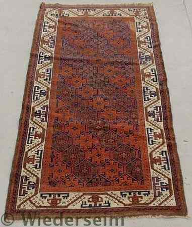 Appraisal: Afghan oriental hall runner with geometric patterns red field and