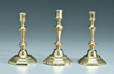 Appraisal: Three th century brass candlesticks stepped octagonal bases one with