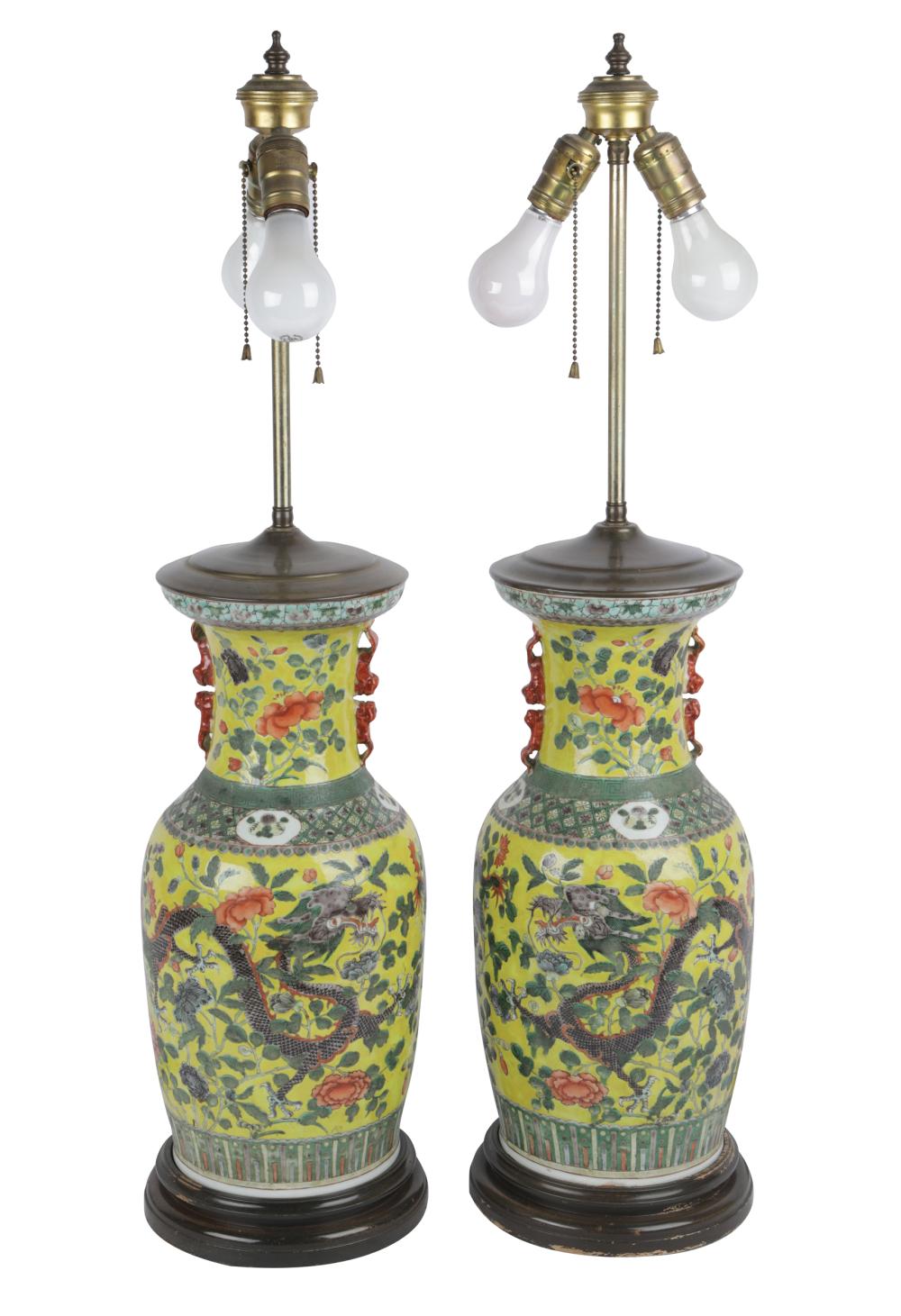 Appraisal: PAIR OF CHINESE FAMILLE JAUNE PORCELAIN VASESmounted as lamps Condition