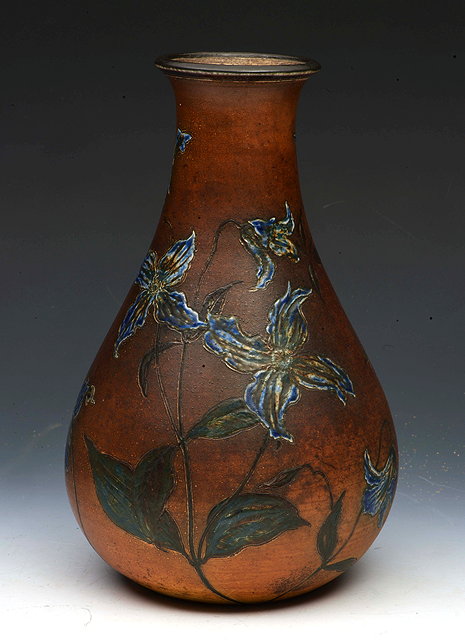 Appraisal: Martin BrothersVase with long stemmed blue flowers incised 'Martin Bros