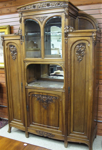 Appraisal: FINE ART NOUVEAU CARVED WALNUT CHINA SIDEBOARD French c The