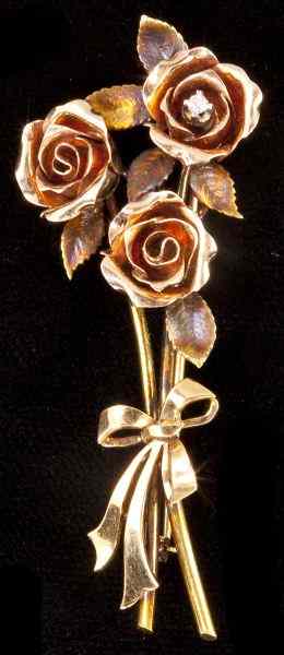 Appraisal: Gold and Diamond Flower Spray Brooch Krementzdesigned in rose and