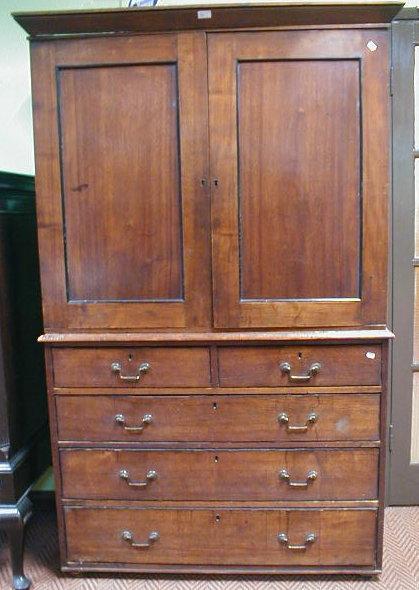 Appraisal: A thC mahogany press cupboard with moulded cornice two ebony