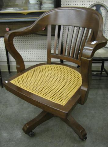 Appraisal: Antique Walnut Desk Chair with castor base and cane seat