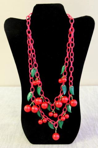 Appraisal: JEWELRY Bakelite Cherry Necklace Double strand link necklace with hanging