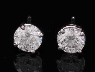 Appraisal: A Pair of Diamond Stud Earrings GIA Certificates Mounted in