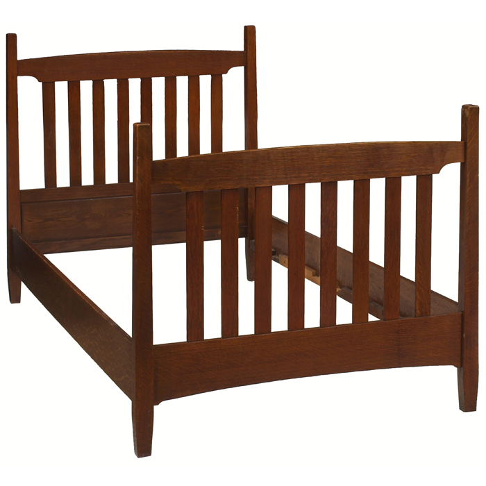 Appraisal: Arts and Crafts bed eight vertical slats to headboard and