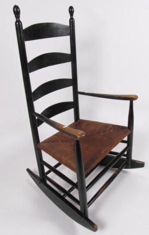 Appraisal: Antique ladder back rocking chair Shaker style with painted black