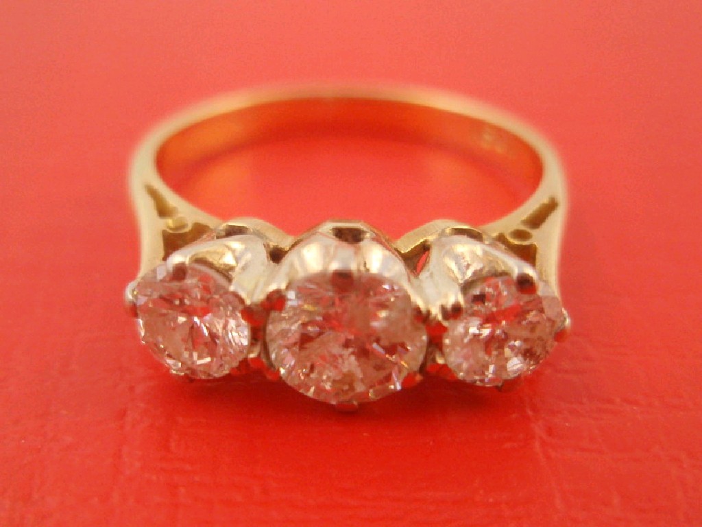 Appraisal: A three stone diamond ring total mounted estimated weight ct