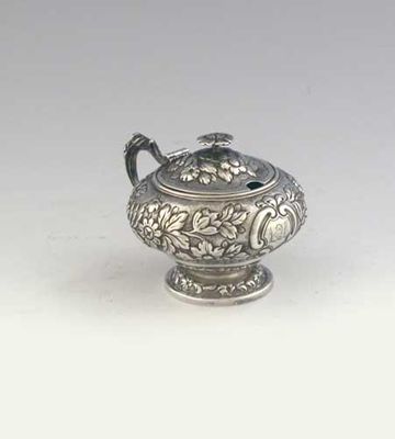 Appraisal: A George III embossed mustard pot squat circular with a