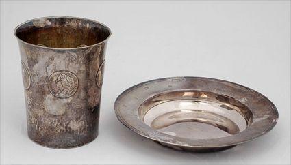 Appraisal: TWO ENGLISH SILVER TABLE ARTICLES Comprising a Birmingham hammered cup