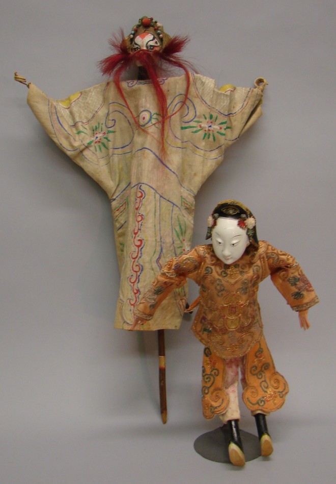 Appraisal: Pair of Asian items Theater stick puppet dressed in painted