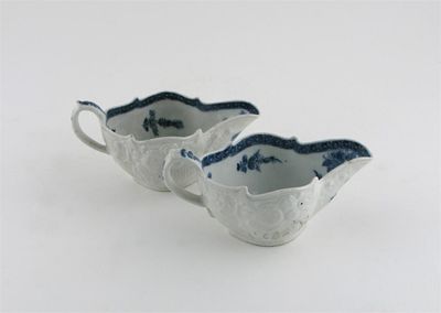 Appraisal: A pair of Chinese blue and white sauceboats after th