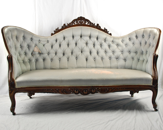 Appraisal: A th C Rococo Revival Sofa having a triple back