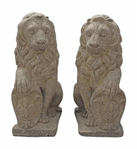 Appraisal: pair Cast stone garden statuary depicting heraldic lions depicted seat