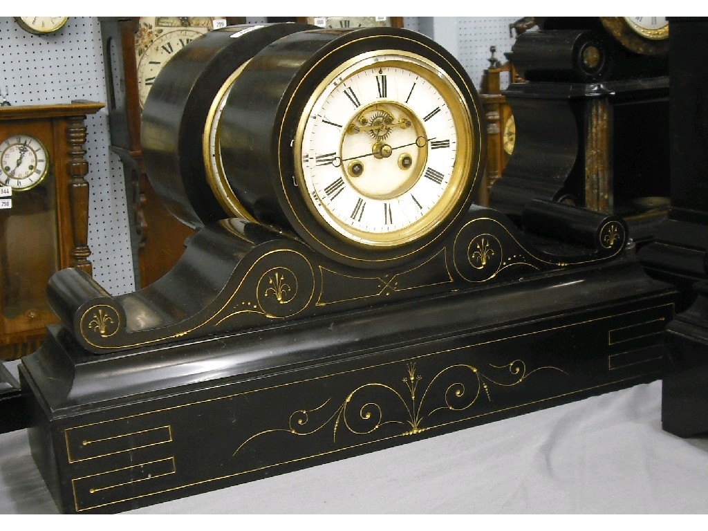 Appraisal: Black slate drumhead two train mantel clock the movement striking