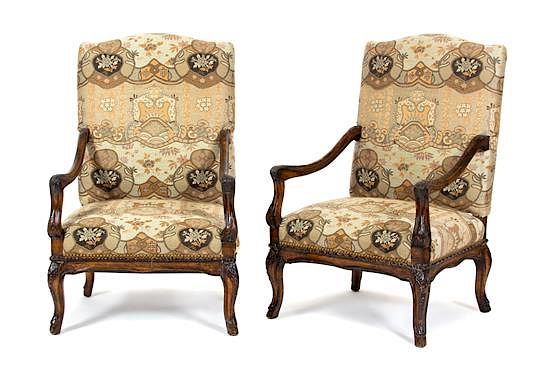 Appraisal: A Pair of Regence Style Carved Walnut Open Armchairs A