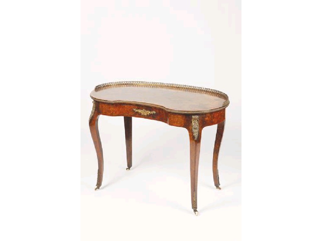 Appraisal: A VICTORIAN BURR-WALNUT KIDNEY-SHAPED WRITING TABLE the inside of the