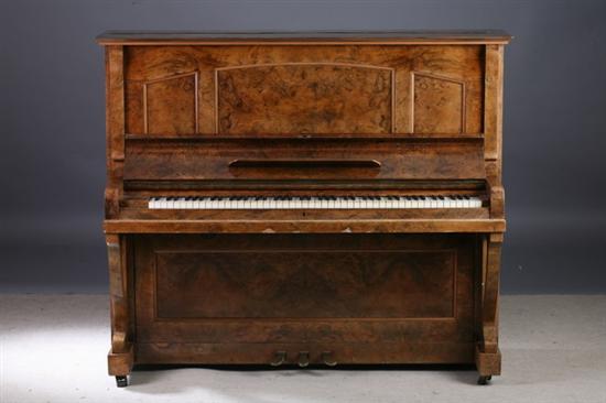 Appraisal: ZEITTER WINKELMANN UPRIGHT BURLED WALNUT PIANO th century Brunschweig Hinged-lid