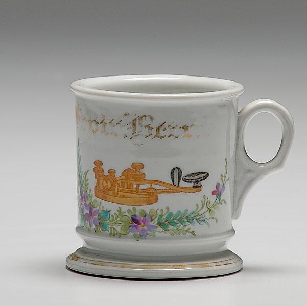 Appraisal: TELEGRAPH OPERATOR'S OCCUPATIONAL SHAVING MUG porcelain with polychrome painted scene