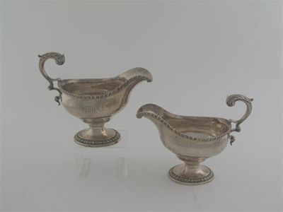 Appraisal: A pair of George III oval sauceboats on pedestal bases