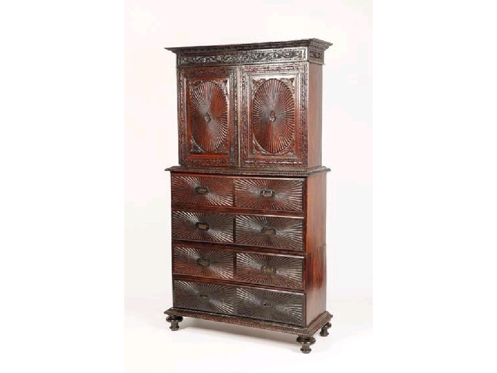 Appraisal: AN ANGLO-INDIAN HARDWOOD SECRETAIRE BOOKCASE the upper section with a