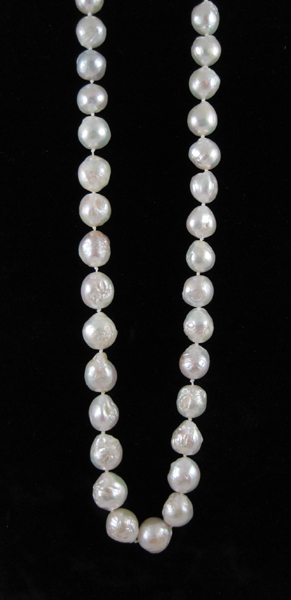 Appraisal: MATINEE LENGTH WHITE BAROQUE PEARL NECKLACE measuring inches in length