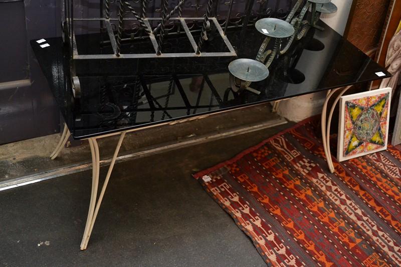 Appraisal: A 'S WROUGHT IRON TABLE WITH A BLACK GLASS TOP