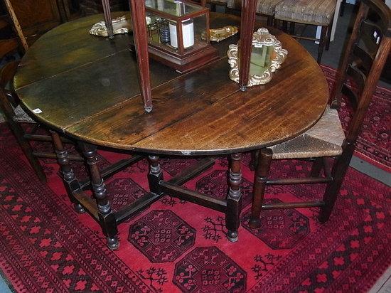 Appraisal: A TH CENTURY OAK LARGE OVAL GATELEG DINING TABLE on