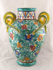 Appraisal: A large baluster shaped vase the handles formed as double