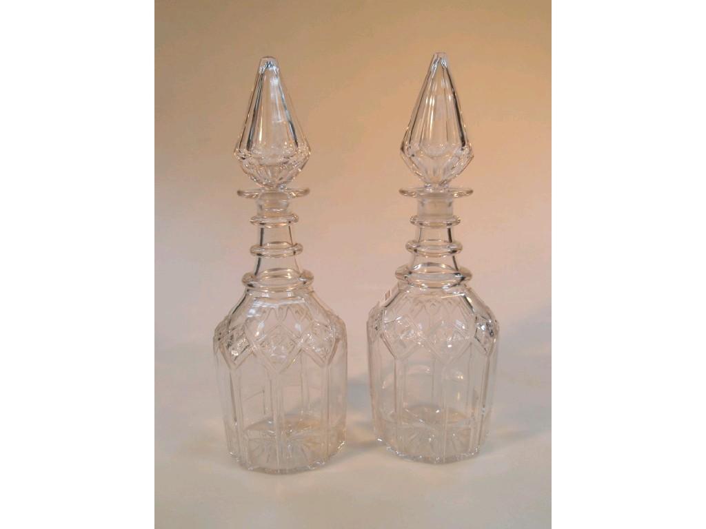 Appraisal: A pair of antique mallet shaped decanters with triple ring