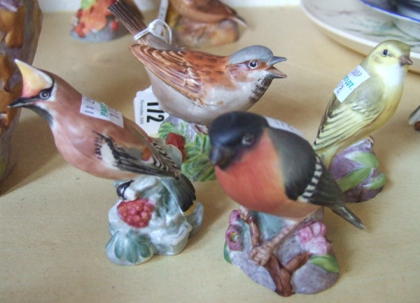 Appraisal: Four Royal Worcester china birds Wood Warbler No Waxwing No