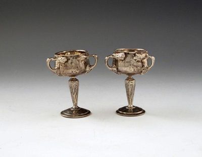 Appraisal: A pair of silver Art Nouveau three handled cups by