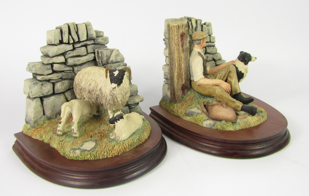 Appraisal: A pair of Border Fine Arts bookends modelled as o'clock