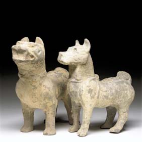 Appraisal: PAIR HAN POTTERY DOGS Pair large well formed Chinese Han