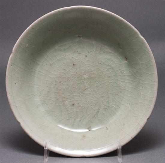 Appraisal: Korean celadon glaze stoneware notched rim dish th th century