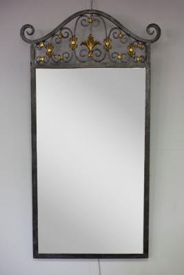 Appraisal: A wrought iron framed mirror cm high