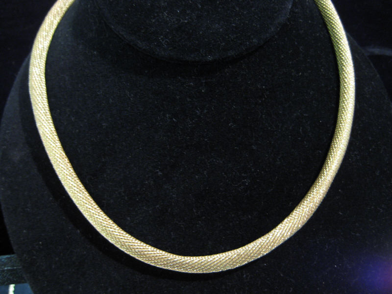 Appraisal: ROLLED GOLD CHAIN k yellow gold flexible rolled link chain