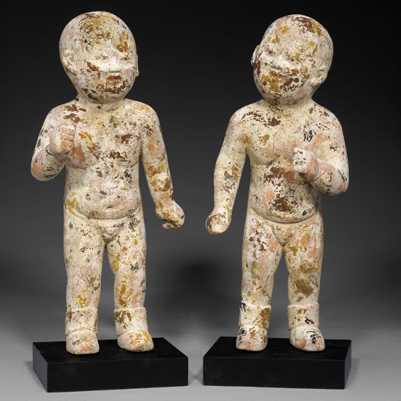 Appraisal: PAIR SONG POTTERY BOY FIGURES Pair extremely rare Chinese Song