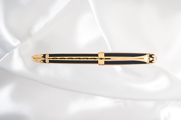 Appraisal: This Michel Perchin blue and gold Faberg fountain pen is