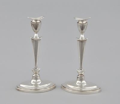 Appraisal: A Pair of British Weighted Sterling Silver Candlesticks Dated marked