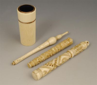 Appraisal: A th century cylindrical ivory pin cushion with gilt bands