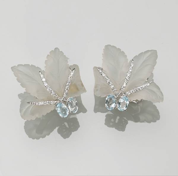 Appraisal: A pair of carved rock crystal aquamarine diamond and k