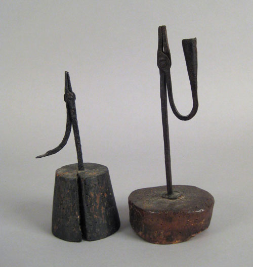 Appraisal: Two wrought iron rush lights th c h and h