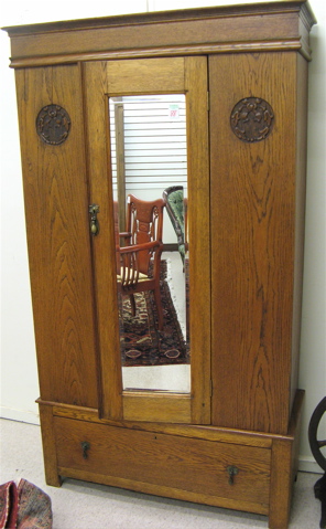 Appraisal: AN OAK WARDROBE English early th century having a single